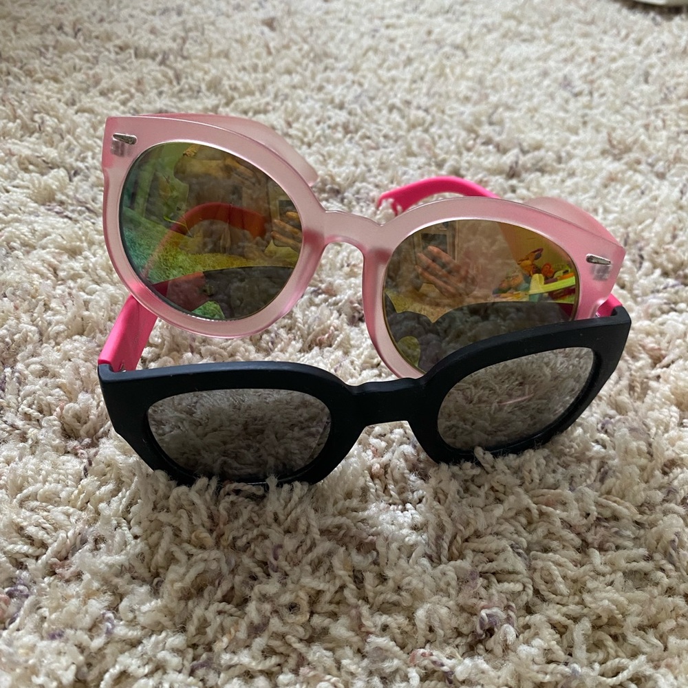 A set of two sunglasses, brand new